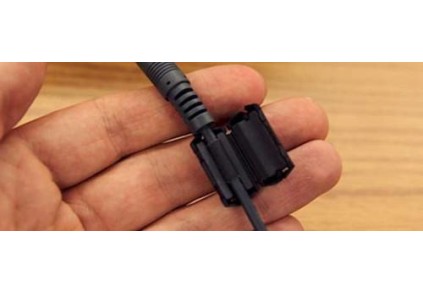 ¿Para qué sirve el cilindro | filtro en cables de cargadores?